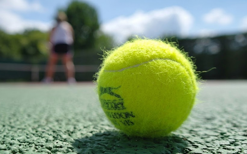 Why are tennis balls fuzzy?