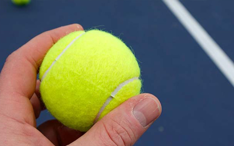 How much does a tennis ball weigh?